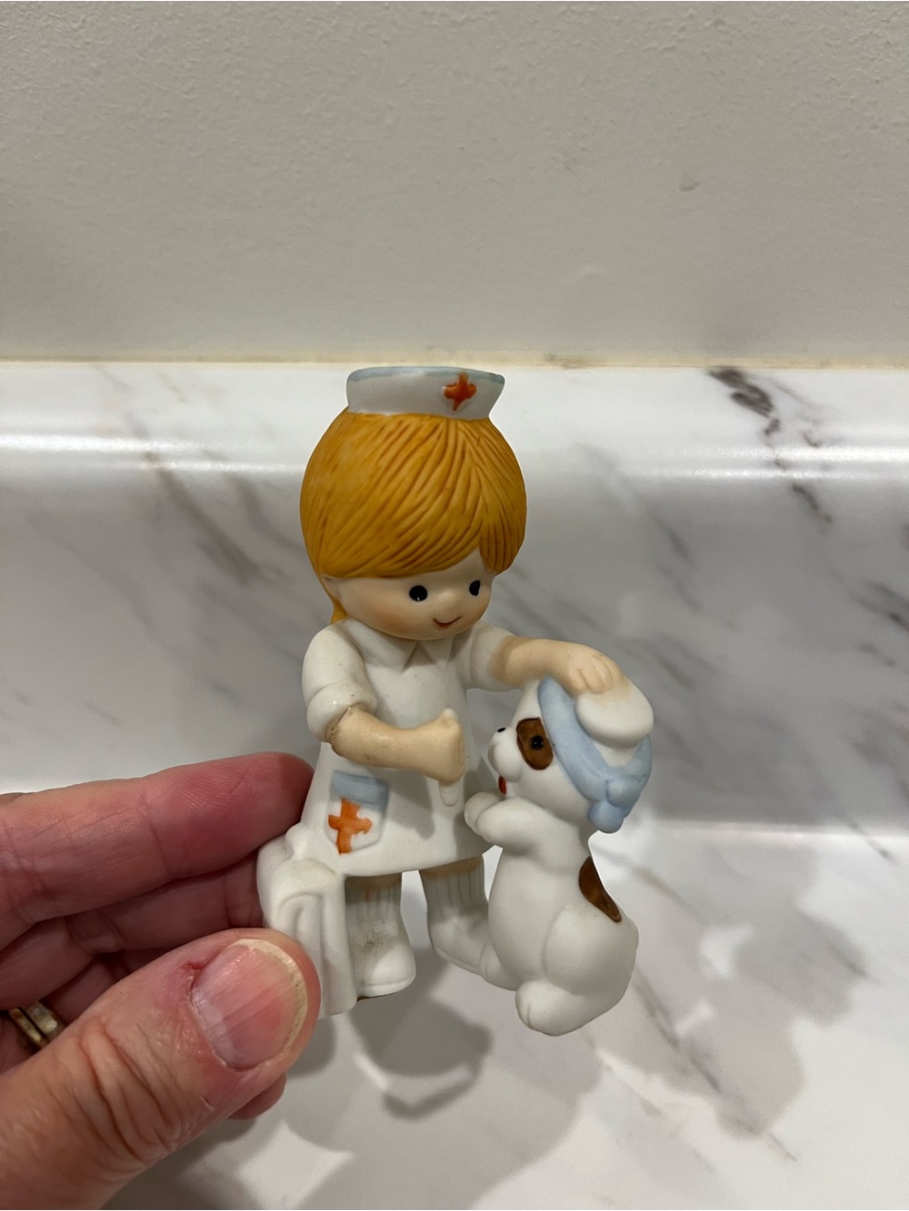 Vintage Enesco 1983 child nurse with Dog Porcelain Figurine